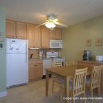 Well-stocked kitchen with dishwasher and granite countertops Well-stocked kitchen with dishwasher and granite countertops